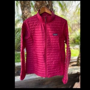 Patagonia women’s down jacket. Pink. Large